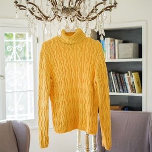 Yellow cow neck sweater.